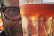 Alton Brown's New Go-To Drink May Surprise You