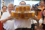 Germany's Oliver Struempfel Sets New World Beer-Carrying Record 